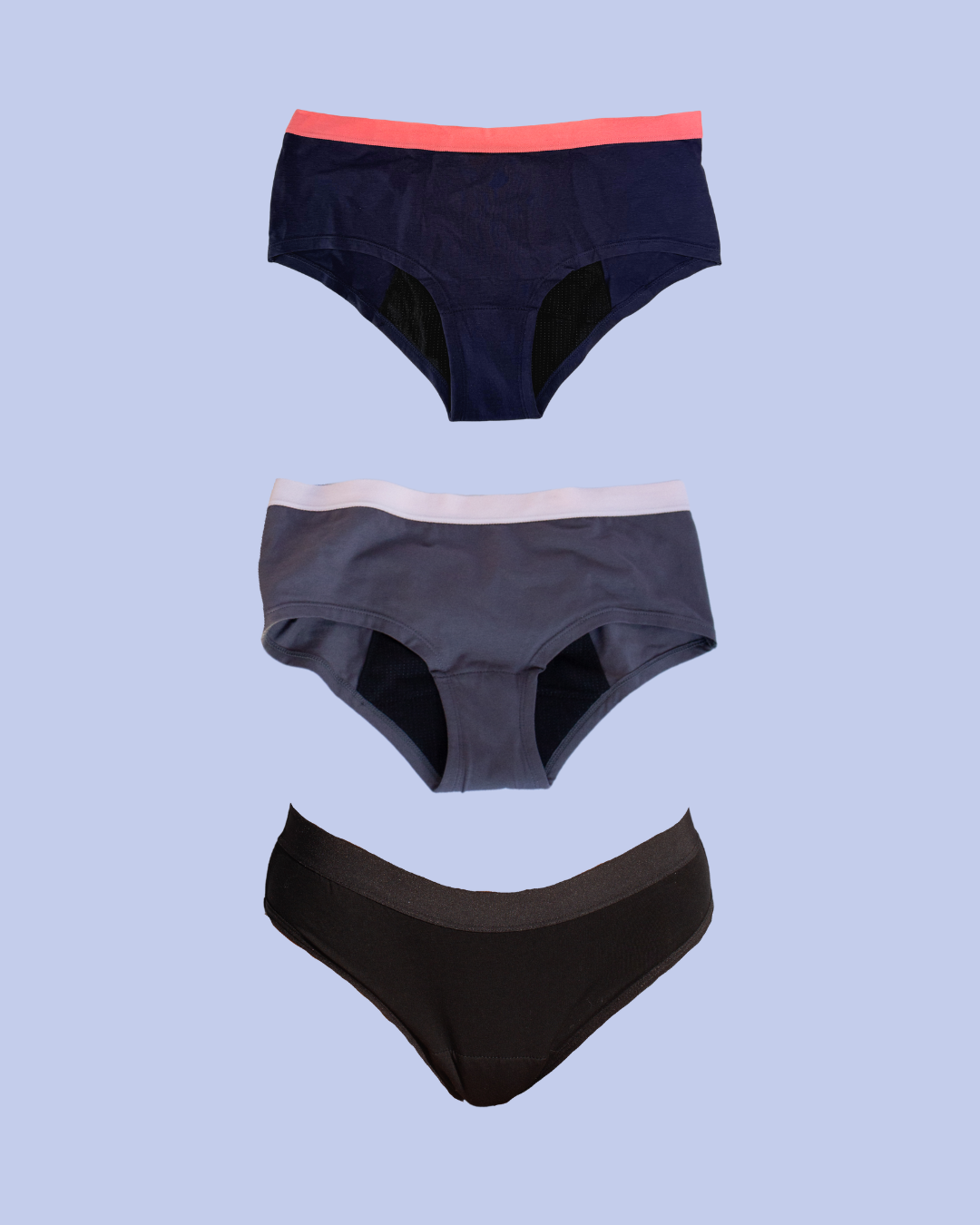 Collage of POM period underwear Teen Starter Pack - One teenage navy pair, one teenage grey pair and one classic black pair