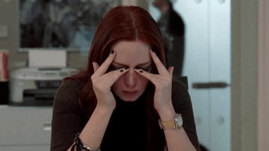 Emily from The Devil Wear Prada looking stressed