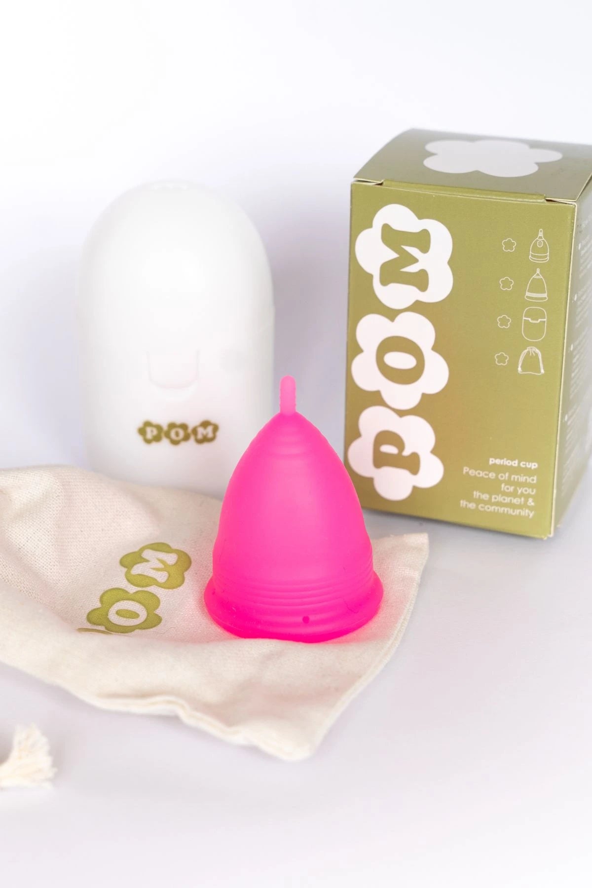 POM Super Soft Menstrual Cup Pack in hot pink, including a medical-grade silicone cup, branded box, organic cotton travel pouch, and steriliser case.