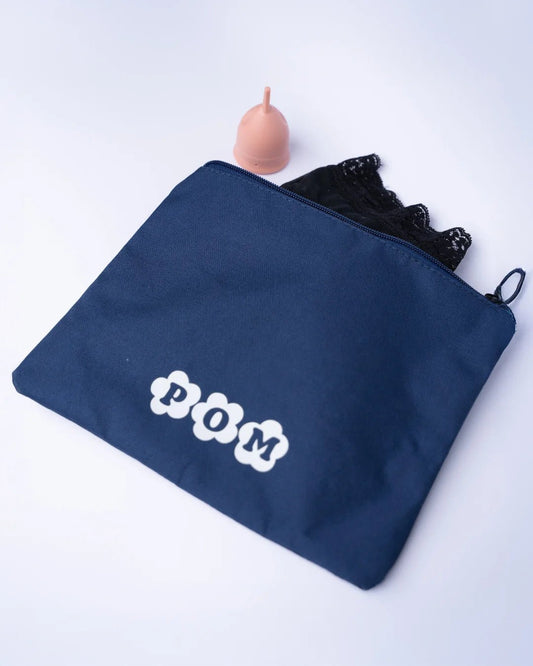 POM Waterproof Toiletry Bag in navy made from rPET (recycled plastic bottles), designed for storing clean or used POM menstrual cups and POM swimwear.